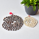Image showing combo of lab-certified Tulsi Mala and Kamal Gatta Mala with 108+1 beads each, beautifully strung and ideal for meditation and prayer