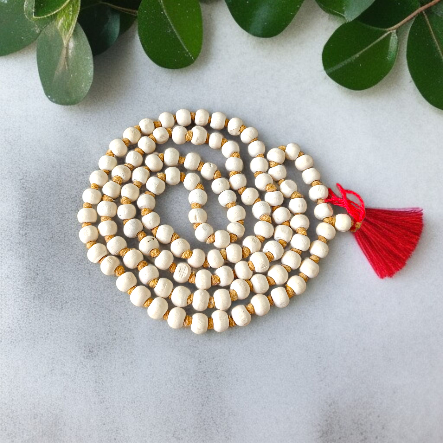 Image showing combo of lab-certified Tulsi Mala and Kamal Gatta Mala with 108+1 beads each, beautifully strung and ideal for meditation and prayer