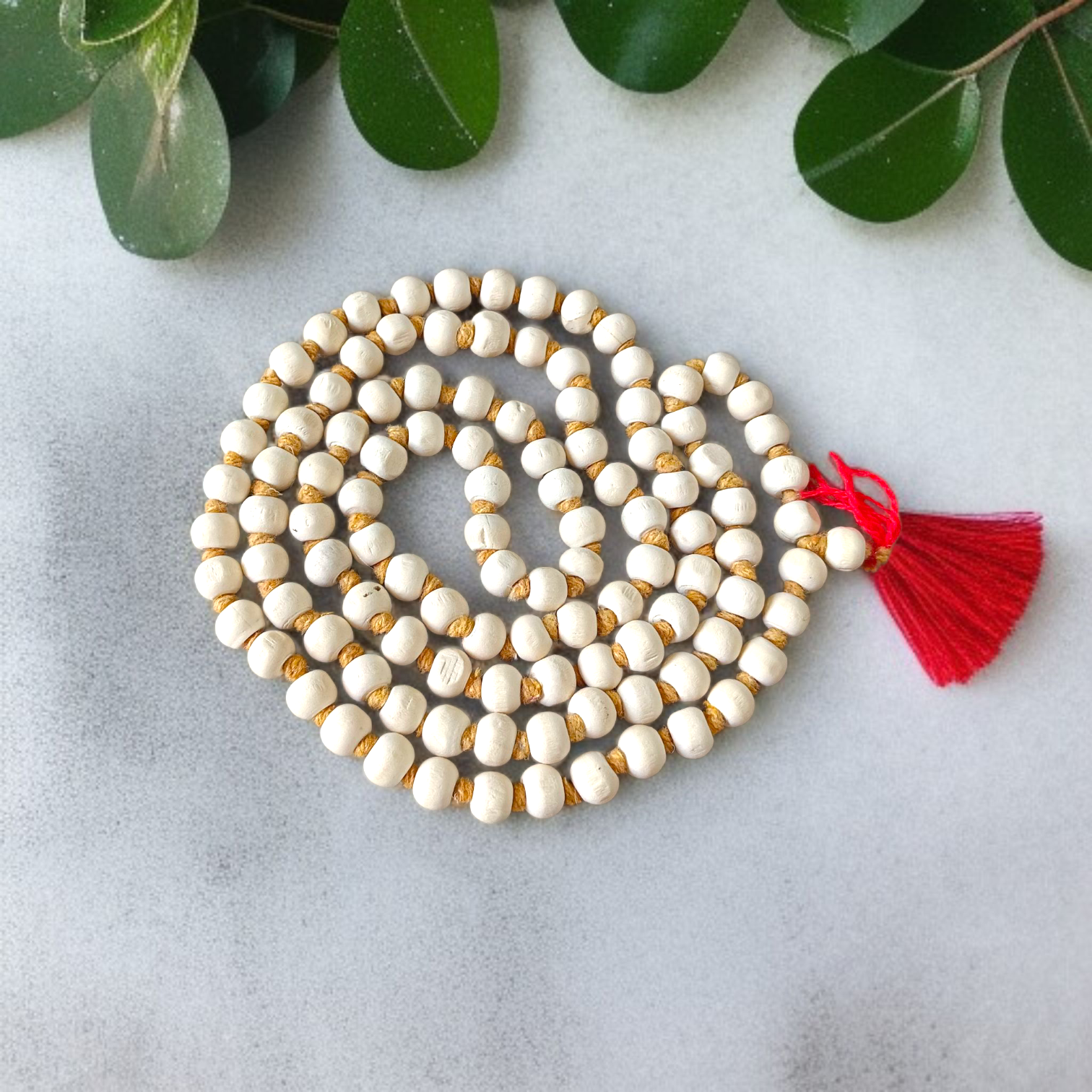 Image showing combo of lab-certified Tulsi Mala and Kamal Gatta Mala with 108+1 beads each, beautifully strung and ideal for meditation and prayer