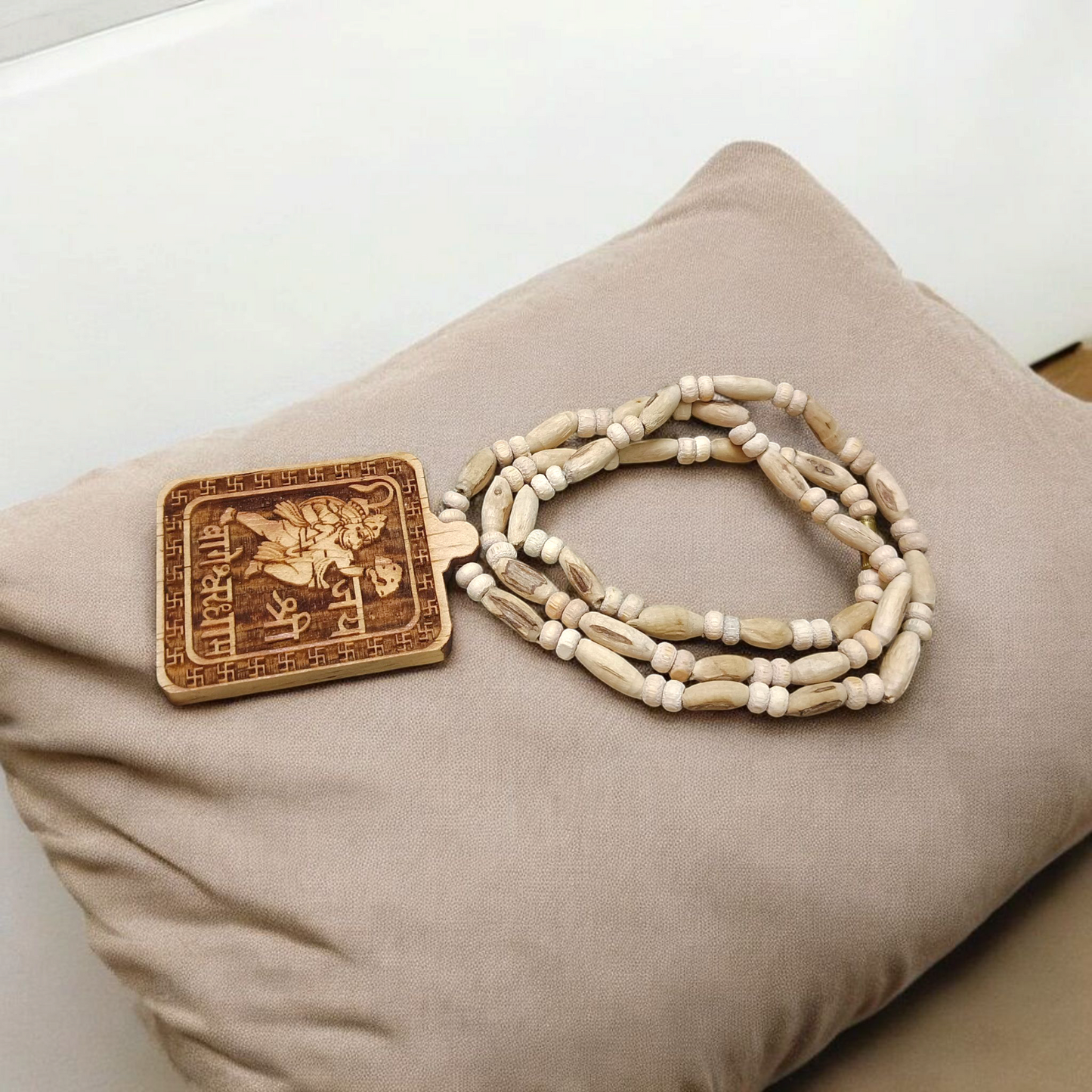 Jai Shri Bageshwar Dham Tulsi Mala with metal locket and screw-lock clasp, displayed against a plain white background