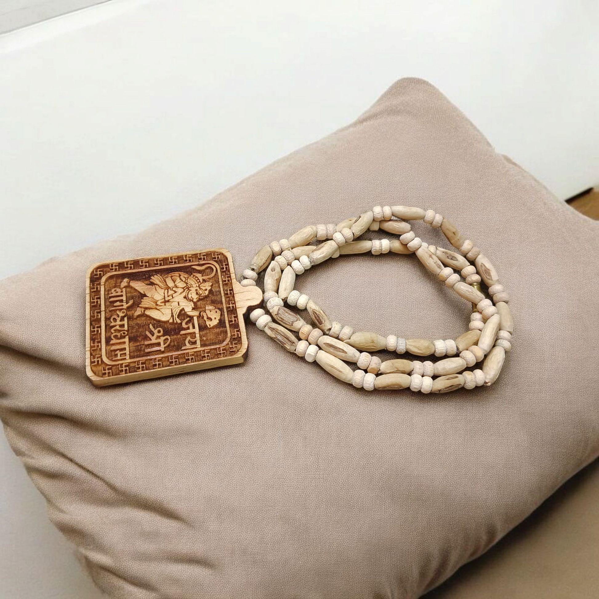 Jai Shri Bageshwar Dham Tulsi Mala with metal locket and screw-lock clasp, displayed against a plain white background