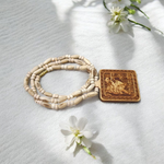 Jai Shri Bageshwar Dham Tulsi Mala with metal locket and screw-lock clasp, displayed against a plain white background