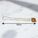 Jai Shri Bageshwar Dham Tulsi Mala with metal locket and screw-lock clasp, displayed against a plain white background