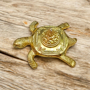 Kachua Shri Yantra – a golden Meru Yantra mounted on a tortoise base, ideal for Vastu correction, prosperity, and spiritual decor