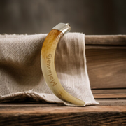 Lab-certified Shukar Dant (Wild Boar Tooth) pendants in silver caps, available in C-shape, U-shape, and baby sizes for protection and business success