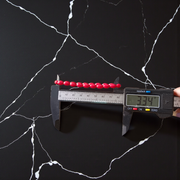 Lab certified Lal Monga (Red Coral) bracelet with polished red beads, ideal for energy, confidence, and astrological balance