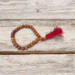 Lab certified White Sandalwood Mala with 108+1 and 27+1 bead variants, handcrafted with sacred intention