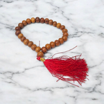 Lab certified White Sandalwood Mala with 108+1 and 27+1 bead variants, handcrafted with sacred intention