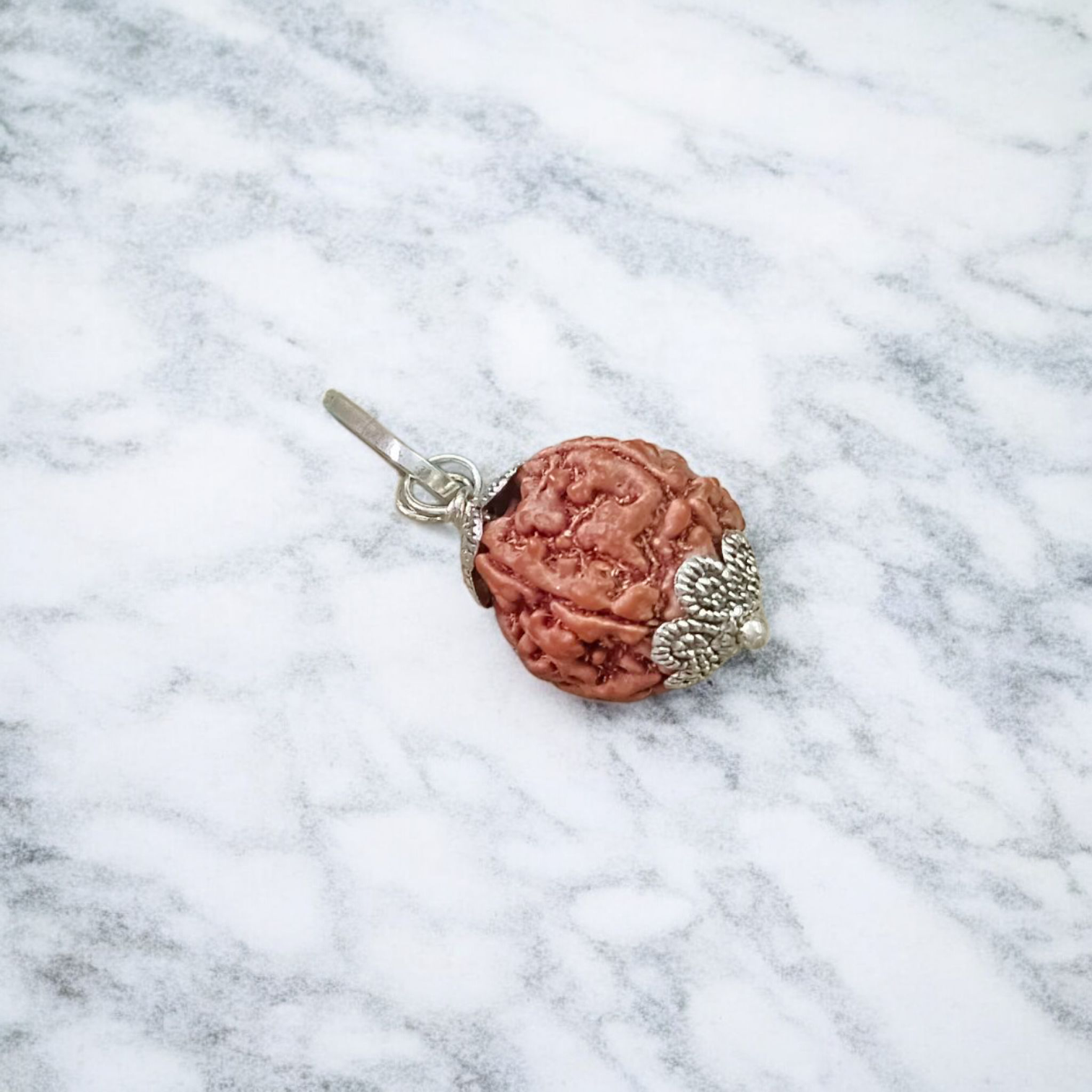 Lab certified pendant featuring 3 Mukhi and 5 Mukhi Rudraksha beads set in a polished metal cap design, used for spiritual transformation and protection