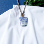 Lapis Lazuli Pendant with white metal chain – deep blue crystal with gold flecks, polished oval shape, lab certified