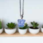 Lapis Lazuli Pendant with white metal chain – deep blue crystal with gold flecks, polished oval shape, lab certified