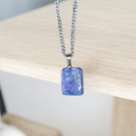 Lapis Lazuli Pendant with white metal chain – deep blue crystal with gold flecks, polished oval shape, lab certified