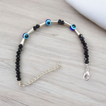 Lightweight black beads anklet with evil eye charm for kids, designed for spiritual protection and daily comfort, by MALAWALA