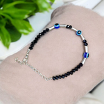 Lightweight black beads anklet with evil eye charm for kids, designed for spiritual protection and daily comfort, by MALAWALA