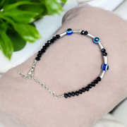 Lightweight black beads anklet with evil eye charm for kids, designed for spiritual protection and daily comfort, by MALAWALA