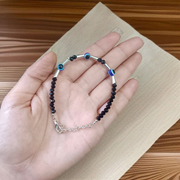 Lightweight black beads anklet with evil eye charm for kids, designed for spiritual protection and daily comfort, by MALAWALA