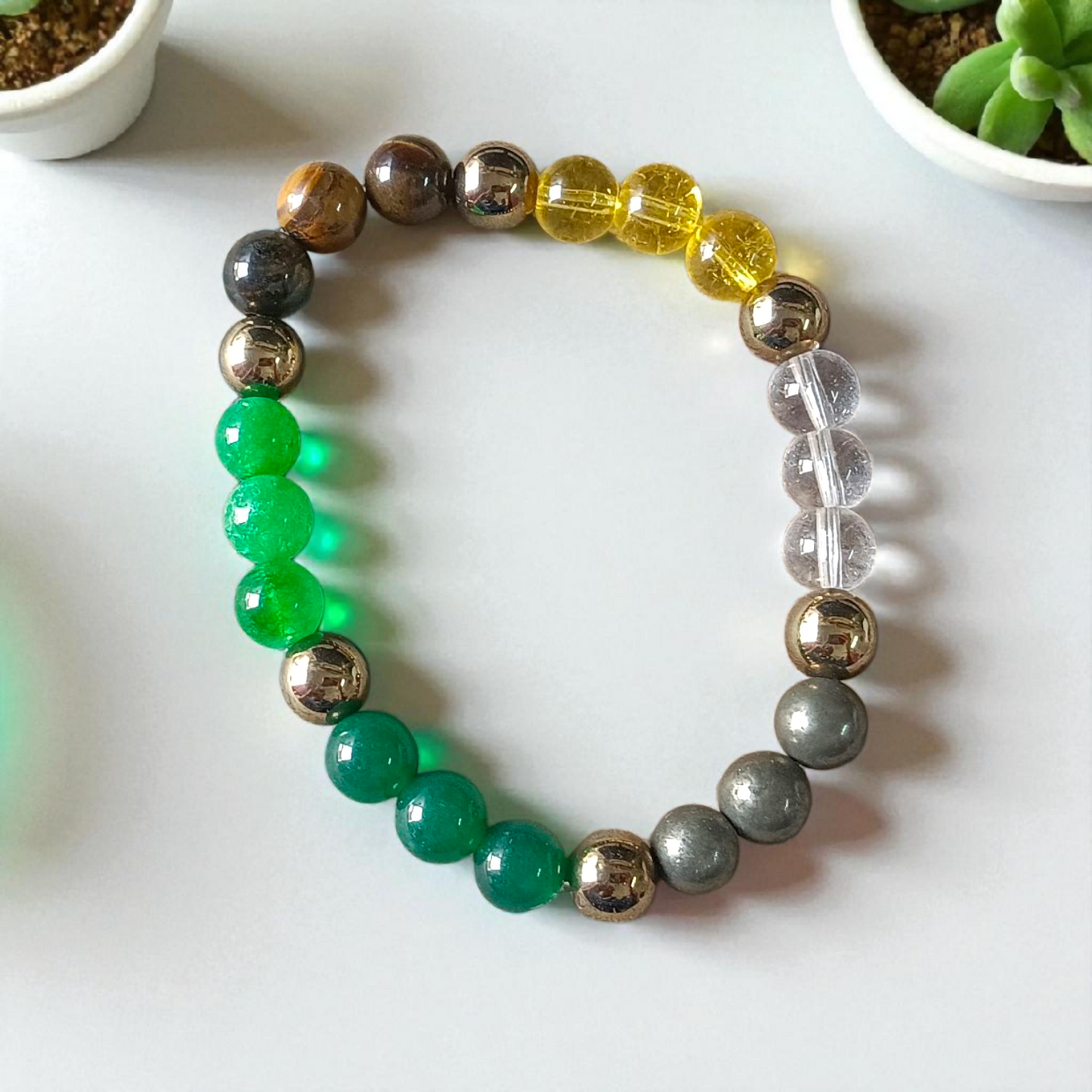 Money Magnet Bracelet with 8mm polished beads made from wealth-attracting stones like Citrine and Pyrite, stretchable for men and women
