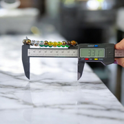 Money Magnet Bracelet with 8mm polished beads made from wealth-attracting stones like Citrine and Pyrite, stretchable for men and women