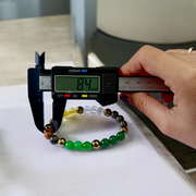 Money Magnet Bracelet with 8mm polished beads made from wealth-attracting stones like Citrine and Pyrite, stretchable for men and women