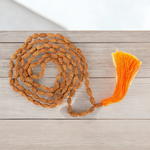 Natural 2 Mukhi Rudraksha Mala with 27+1 and 108+1 bead options, used for unity and relationships, from Malawala with lab certificate