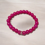 Natural Pink Agate Bracelet with 8mm round beads, stretchable design, suitable for meditation and spiritual use