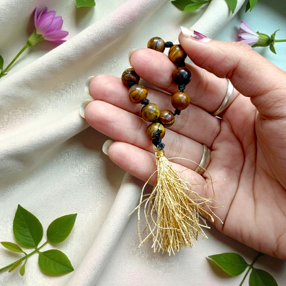 Natural Tiger Eye Finger Mala with 9+1 lab-certified golden-brown beads, handcrafted for meditation, focus, and willpower enhancement by MALAWALA