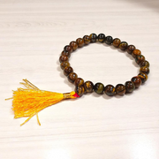 Natural Tiger Eye Mala with 108+1 beads and guru bead, handcrafted and polished, used for meditation and protection