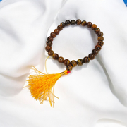 Natural Tiger Eye Mala with 108+1 beads and guru bead, handcrafted and polished, used for meditation and protection