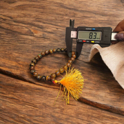 Natural Tiger Eye Mala with 108+1 beads and guru bead, handcrafted and polished, used for meditation and protection