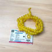Natural Yellow Hakik Mala 8MM beads with spiritual threadwork and lab certificate, displayed in two variants