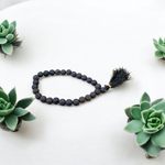 Natural black lava stone mala with 108+1 beads, handcrafted for meditation and healing – Malawala