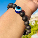 Natural unpolished ebony wood (Karungali Kattai) bracelet with blue evil eye bead – protection and grounding wristband for men and women