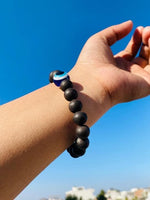 Natural unpolished ebony wood (Karungali Kattai) bracelet with blue evil eye bead – protection and grounding wristband for men and women