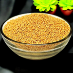 Organic yellow mustard seeds (Peeli Sarso) in a bowl, golden color, pure and ritual-ready