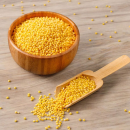 Organic yellow mustard seeds (Peeli Sarso) in a bowl, golden color, pure and ritual-ready