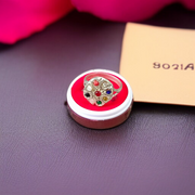 Oval-shaped gold-plated Navratan ring with nine colorful gemstones set in a tortoise design for spiritual and astrological benefits