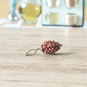Pendant featuring lab certified 3 Mukhi and 4 Mukhi Rudraksha beads in a dual-metal cap design, placed against a neutral background