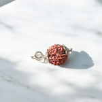 Pendant featuring lab certified 6 Mukhi and 5 Mukhi Rudraksha beads in handcrafted metal caps, ideal for focus, study, and prayer