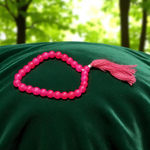 Pink Hakik Mala made from natural pink agate beads with 108+1 and 27+1 variants, used for meditation and emotional healing