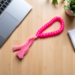 Pink Hakik Mala made from natural pink agate beads with 108+1 and 27+1 variants, used for meditation and emotional healing