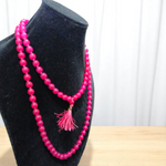 Pink Hakik Mala made from natural pink agate beads with 108+1 and 27+1 variants, used for meditation and emotional healing
