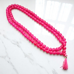 Pink Hakik Mala made from natural pink agate beads with 108+1 and 27+1 variants, used for meditation and emotional healing