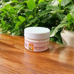 Pure white sandalwood paste (Safed Chandan Tilak) in a small container with creamy texture, ready for spiritual application