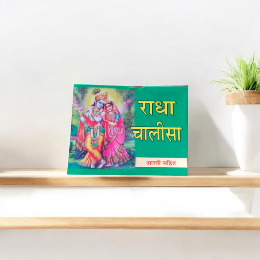 Radha Chalisa Hindi Book with devotional artwork of Radharani, placed beside incense and flowers in a prayer setting