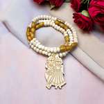 Radha Krishna Tulsi Chandan Mala featuring alternating Tulsi and sandalwood beads, engraved pendant, and screw-lock clasp, displayed neatly