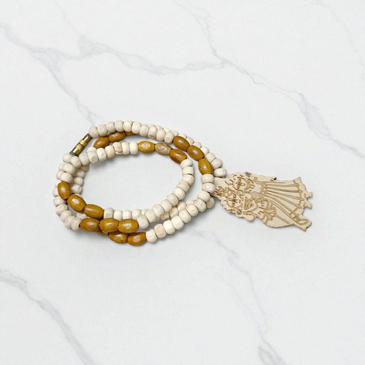 Radha Krishna Tulsi Chandan Mala featuring alternating Tulsi and sandalwood beads, engraved pendant, and screw-lock clasp, displayed neatly