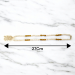 Radha Krishna Tulsi Chandan Mala featuring alternating Tulsi and sandalwood beads, engraved pendant, and screw-lock clasp, displayed neatly