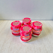 Red chandan paste container used for tilak, puja, and religious ceremonies