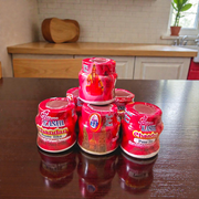 Red chandan paste container used for tilak, puja, and religious ceremonies