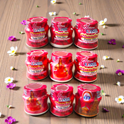 Red chandan paste container used for tilak, puja, and religious ceremonies